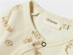 Lil Atelier body wrap turtledove med kaniner